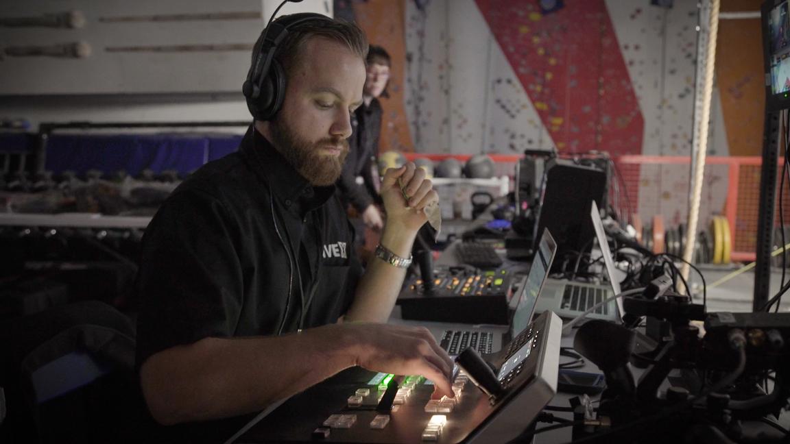 Technical Director setting up the switcher